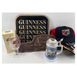 Beer Advertising Collectibles Lot with Guinness Tray, Stella Artois Glass, Stein, Wall Rack, and House of Holbein Hats