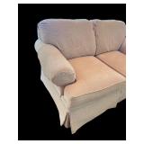 Beige Upholstered Loveseat