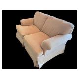 Beige Upholstered Loveseat