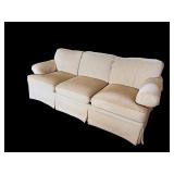 Beige 3-Cushion Sofa with Rolled Arms