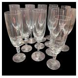 Collection of Elegant Glassware Including Stemware and Carafe