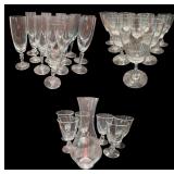 Collection of Elegant Glassware Including Stemware and Carafe