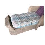 Wicker Chaise Lounge with Plaid Cushion and Purple Pillow