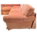Large Sectional Sofa with Rust-Colored Upholstery and Rolled Arms