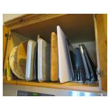 Cupboard full of cutting boards, co... Cupboard full of cutting boards, co...