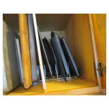 Cupboard full of cutting boards, co... Cupboard full of cutting boards, co...