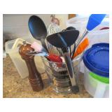 Glass container with misc kitchen u... Glass container with misc kitchen u...