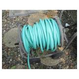 Manual hose reel with hose and wate... Manual hose reel with hose and wate...