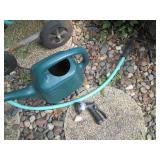 Manual hose reel with hose and wate... Manual hose reel with hose and wate...