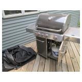 Stainless steel Weber gas grill sea... Stainless steel Weber gas grill sea...