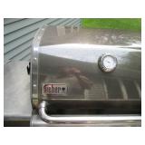 Stainless steel Weber gas grill sea... Stainless steel Weber gas grill sea...