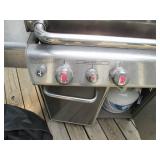 Stainless steel Weber gas grill sea... Stainless steel Weber gas grill sea...