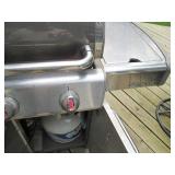 Stainless steel Weber gas grill sea... Stainless steel Weber gas grill sea...