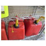 4-large plastic gas cans... 4-large plastic gas cans...
