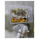 Covered tote containing a variety o... Covered tote containing a variety o...