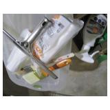 Covered tote containing a variety o... Covered tote containing a variety o...