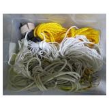 Covered tote containing a variety o... Covered tote containing a variety o...