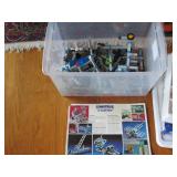 Covered tote containing a variety o... Covered tote containing a variety o...