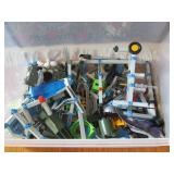 Covered tote containing a variety o... Covered tote containing a variety o...