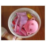 Covered tote containing a variety o... Covered tote containing a variety o...