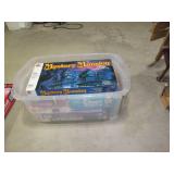 Covered tote containing a variety o... Covered tote containing a variety o...