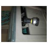 Enclosed hose reel with sprayer... Enclosed hose reel with sprayer...