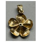 14k Gold Floral Pendant with Light Blue Gemstone Center