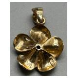 14k Gold Floral Pendant with Light Blue Gemstone Center