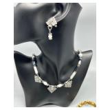 Assorted Jewelry Collection Featuring Necklaces, Earrings, and Bracelets