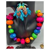 Vibrant Collection of Handmade Wood Beaded Jewelry and Fabric Brooches