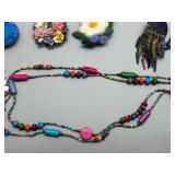Vibrant Collection of Handmade Wood Beaded Jewelry and Fabric Brooches