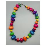 Vibrant Collection of Handmade Wood Beaded Jewelry and Fabric Brooches