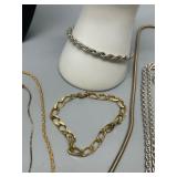 Assorted Collection of Gold and Silver Tone Necklaces and Bracelets including Monet and Kremenz
