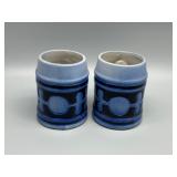 MCM Pair of Blue Stoneware Beer Steins with Relief Design