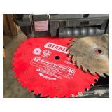 Assorted Grinding Wheels, Assorted Saw Blades, (2) DeWalt Tool Cases (empty)