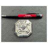 Octagonal Relief Silver Coin with Compass