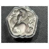 Silver Piece with Snake and Apple Design