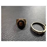 Three Rings Featuring a Class Ring, Band, and Gold-Tone Diamond-Style Ring