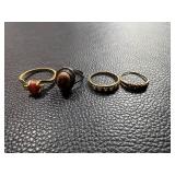 Four Assorted Rings Featuring Gemstones