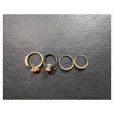 Four Assorted Rings Featuring Gemstones