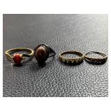 Four Assorted Rings Featuring Gemstones