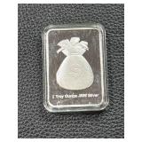1 Troy Ounce .999 Silver Bar Featuring Duck and Dollar Bag Design
