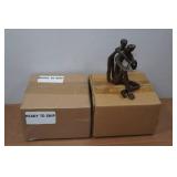 *2* Dayna B. Cast Iron Sculpture - Child Embracing Father *2* Dayna B. Cast Iron Sculpture - Child Embracing Father