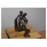 *2* Dayna B. Cast Iron Sculpture - Child Embracing Father *2* Dayna B. Cast Iron Sculpture - Child Embracing Father