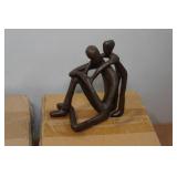 *2* Dayna B. Cast Iron Sculpture - Child Embracing Father *2* Dayna B. Cast Iron Sculpture - Child Embracing Father