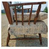 Antique wingback wooden rocking chair