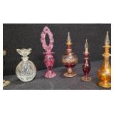 Collection of 11 Antique perfume bottles
