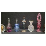 Collection of 11 Antique perfume bottles