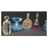 Collection of 11 Antique perfume bottles