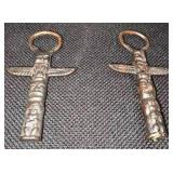 2 Iron totem pole bottle openers